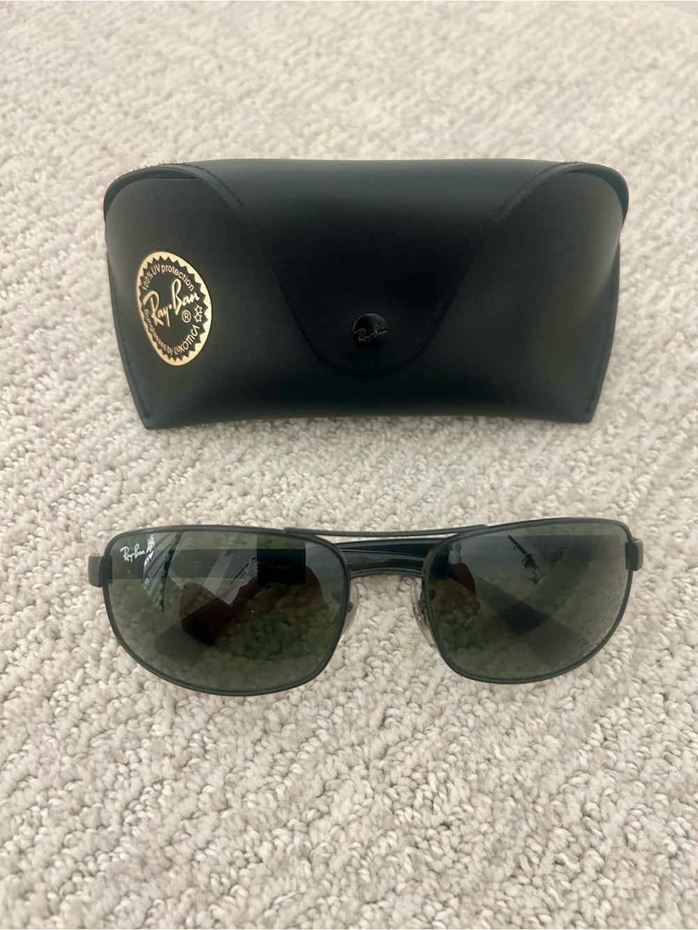 Ray-Ban Black Frame Sunglasses with Green Lenses